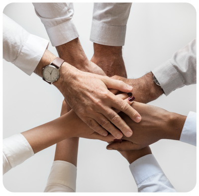 Hands joined highlighting REvalu’s trusted NRI assistance.